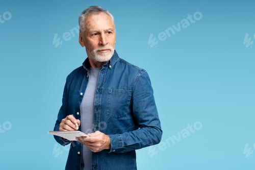 Preview: Portrait of serious gray haired senior man, businessman wearing stylish casual clothes looking away,