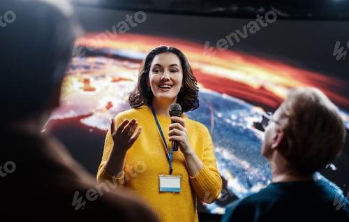 Preview: woman is giving a presentation at conference