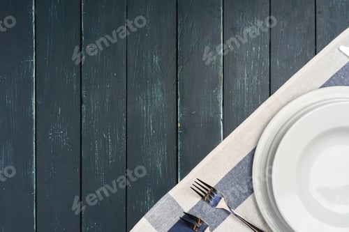 Preview: Table setup with plates on dark wooden background