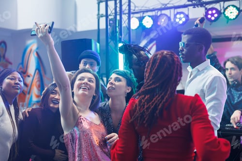 Preview: Clubbers taking group photo in club