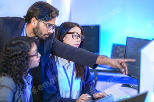 Preview: A data science team collaborates, analyzing a neural network model and code