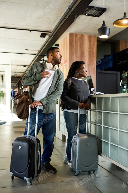 Preview: Young travelers exploring a hotel lobby while preparing for a memorable vacation together