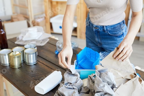 Preview: Woman working with waste