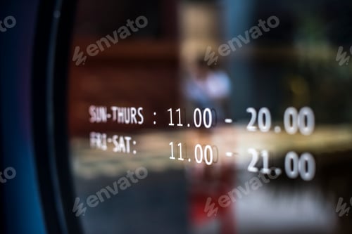 Preview: Business hours announcement on a window