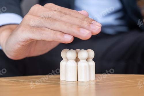 Preview: Businessman hand cover man wooden from crowd of people