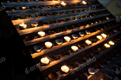 Preview: Line of round candles in the church at wedding ceremony
