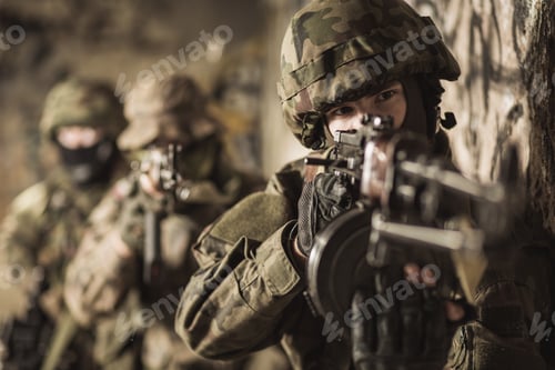 Preview: Armed Soldiers in Camouflage with Rifles