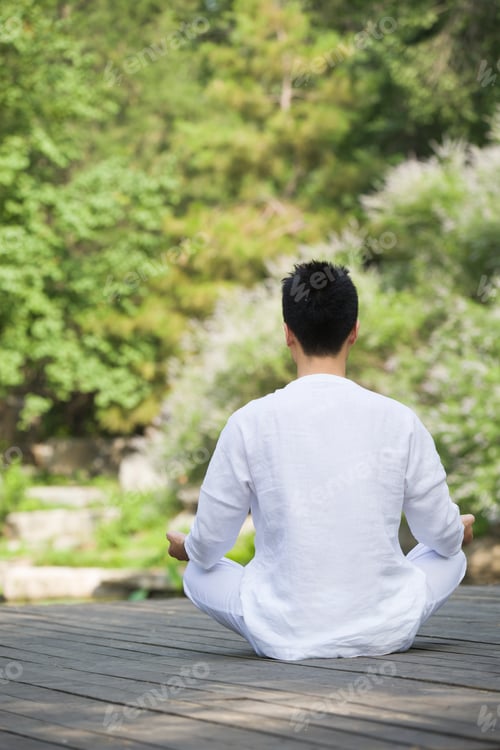 Preview: Young man practicing yoga
