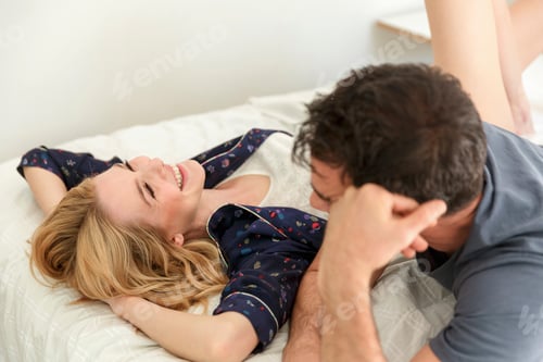 Preview: Couple reclining, smiling