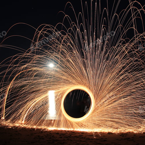 Preview: Long exposure shot at full moon night on the beach designing letters « io »