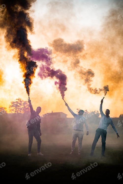 Preview: Three guys waving smoke bombs
