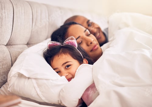 Preview: Family, portrait of a girl in bed with her parents and morning with adorable little child in the be