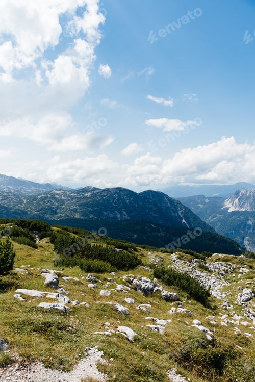 Preview: Scenic view of valley amidst mountains in the Alps