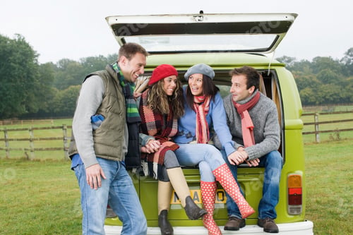 Preview: Couples at back of camper van