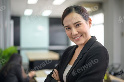 Preview: Portrait of Asian business woman is smiling in office