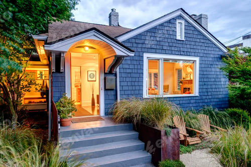 Preview: Illuminated front stoop and of blue house