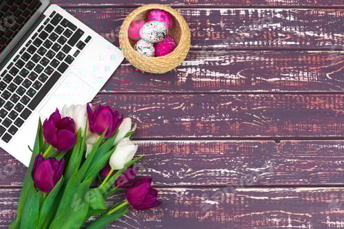 Preview: Easter eggs, mockup laptop and bouquet of tulips