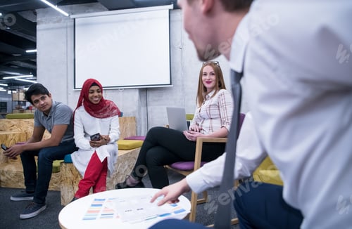 Preview: Multiethnic startup business team having meeting