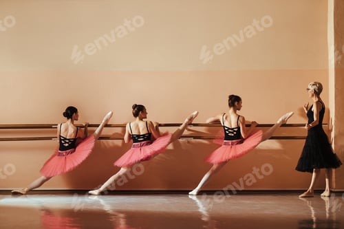 Preview: Group of ballet dancer stretching on a barre at ballet school.