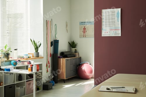 Preview: Physical Therapy Room with Various Exercise Equipment Displayed