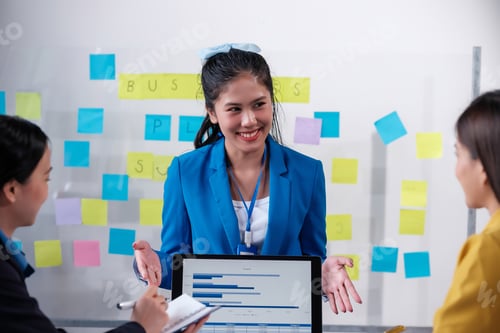 Preview: Business, board and Asian woman with presentation, planning and explain process at a workshop.