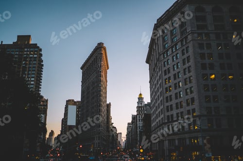 Preview: Modern buildings and busy streets in evening