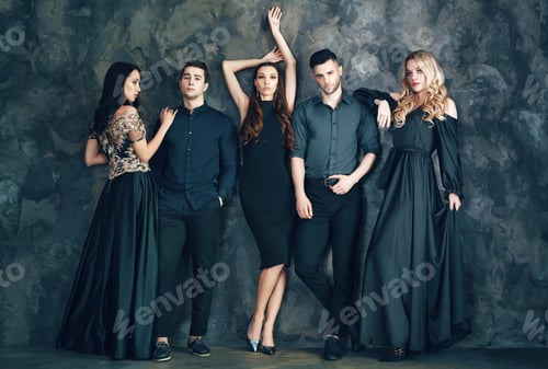 Preview: Group of young beautiful people posing in studio