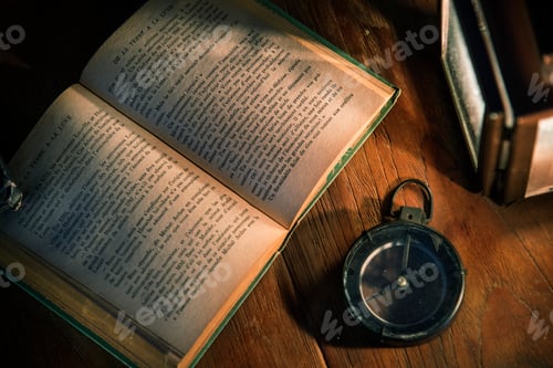 Preview: An old book on a wooden table