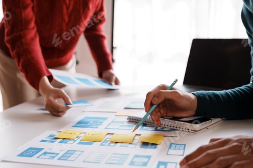 Preview: Designer, programmers, developers of mobile applications work together to invent a modern mobile