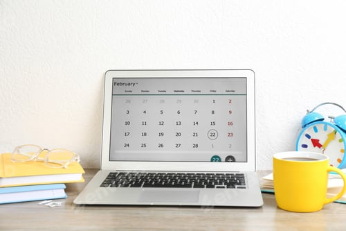 Preview: Modern laptop with calendar app in office