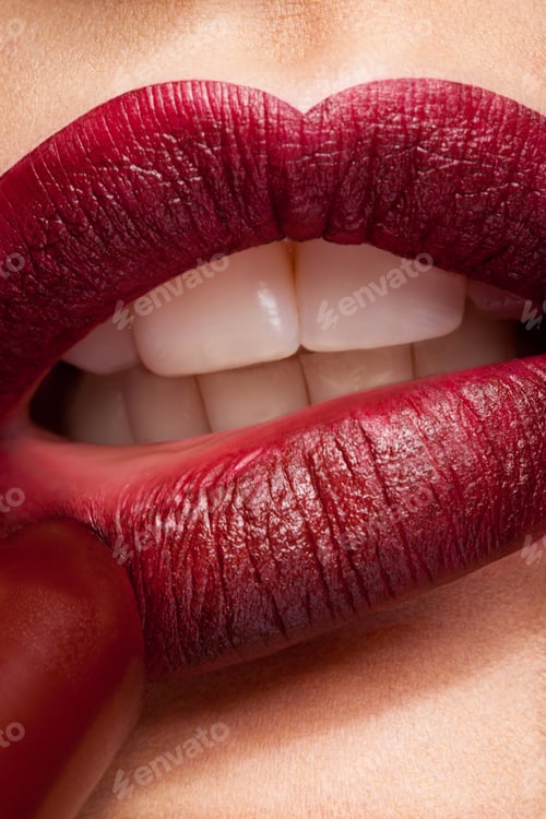 Preview: Applying lipstick on red lips in really close up photo