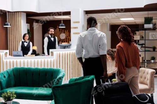Preview: African american guests at front desk