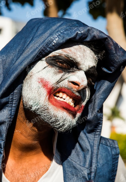 Preview: Close-up portrait of a horrible scary zombie man. Horror. Halloween.