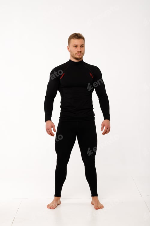 Preview: A man with a sporty physique in thermal underwear.