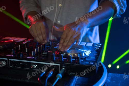 Preview: DJ playing turntable music on night club party