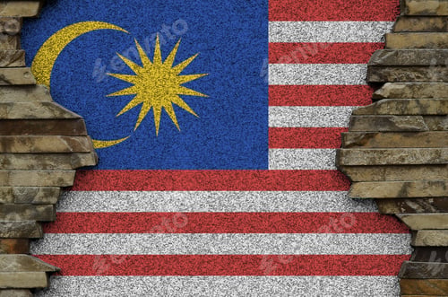Preview: Malaysia flag depicted in paint colors on old stone wall close up