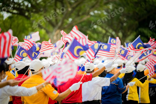 Preview: flags waving at merdeka day independence celebration in malaysia