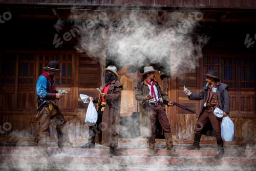 Preview: Cowboys group showing action success bank rob with fighting gun and a lot of money from rob the bank