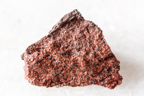 Preview: sample of raw analcimolite rock on white marble