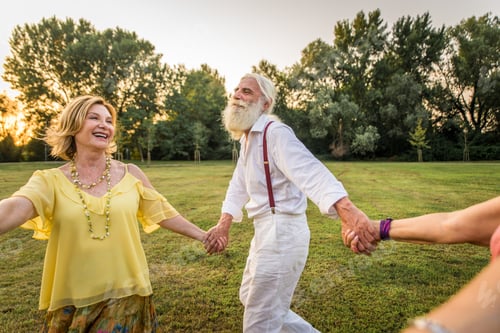 Preview: Group of senior people bonding outdoors