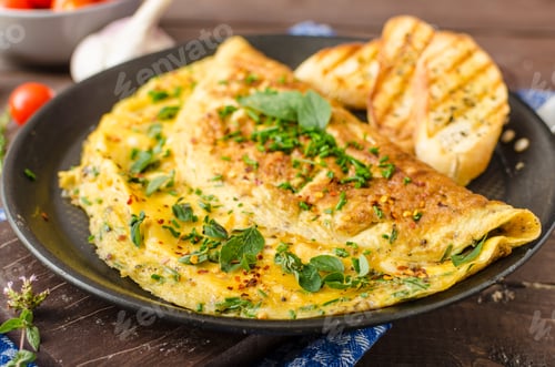 Preview: Herb omelette with chives and oregano sprinkled with Herb omelette with chili flakes
