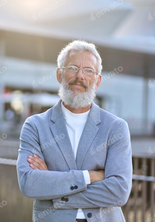 Preview: Confident mature older business man outdoor vertical portrait.