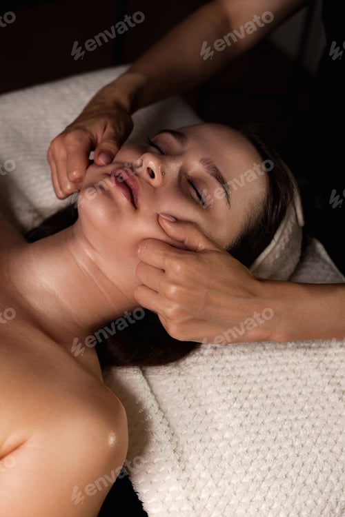 Preview: Facial Rejuvenation Session for Young Woman in Serene Medical Massage Room