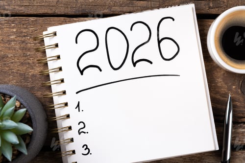 Preview: New year goals 2026 on table. 2026 resolutions list with notebook, plant on wooden background