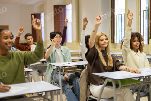 Preview: Enthusiastic Students Raising Hands in a Classroom