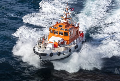 Preview: Beautiful shot of a pilot boat in motion on a sunny day in Norway
