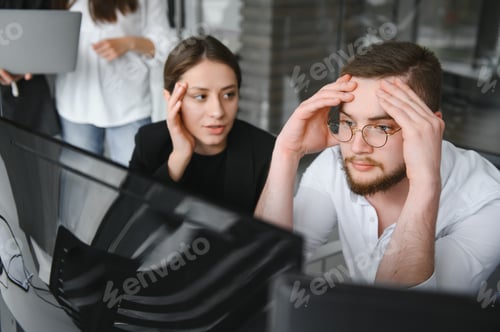Preview: Business people working on project in office