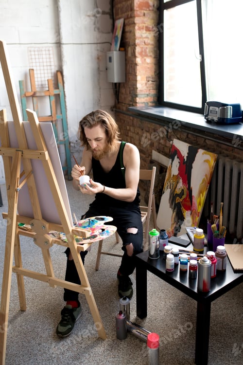 Preview: Modern Artist Painting on Easel