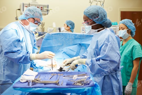 Preview: Surgical Team Working In Operating Theatre