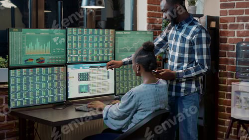 Preview: Business team working with stock market statistics on multi monitors